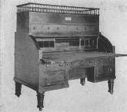 A very solid but not especially pleasing desk that was
used by Washington while he was President. The railing is interesting.
The idea was used by Chippendale in his gallery tables.