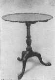 This Chippendale pie crust tip table shows the tripod
base with claw feet and the carved edge which gives it its name, and
which was carved down to the level, never applied. A genuine antique pie
crust table is very valuable.