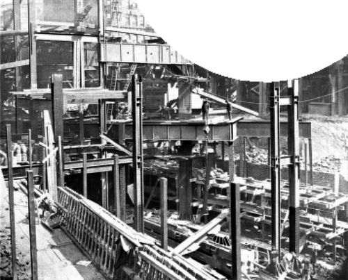 SUBWAY THROUGH NEW "TIMES" BUILDING, SHOWING
INDEPENDENT CONSTRUCTION&mdash;THE WORKMEN STAND ON FLOOR GIRDERS OF
SUBWAY