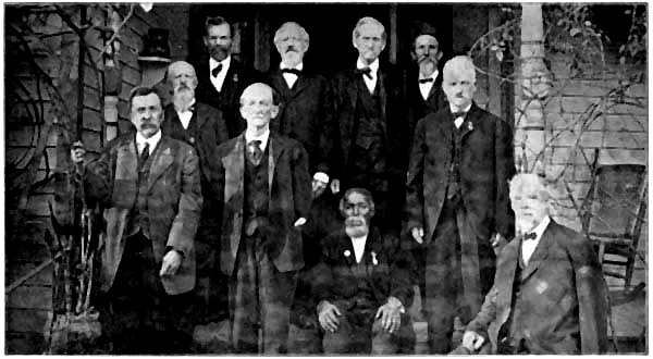From left to right, back row—Private
Thrower, Orderly Sergeant George Little, Sergeant John Little, Bugler
Minardo Rosser. Second row, left—Lieut. Harvey Cribbs; right,
Artificer William Johnson. Front row, left—Corporal Thos. Owen,
Walt