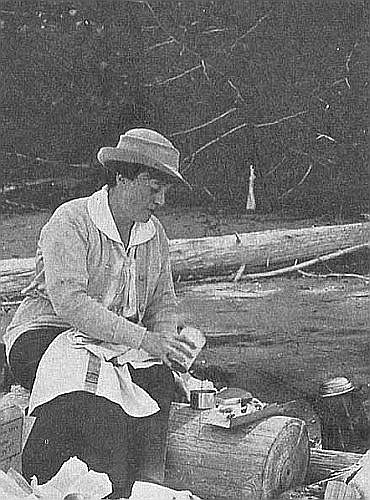 A woman outdoors in scouting
attire