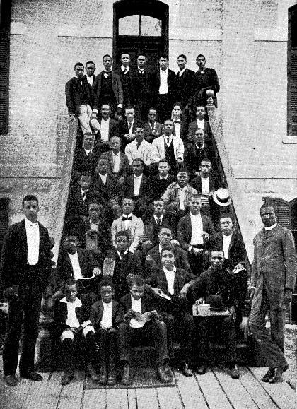 GROUP OF STUDENTS ON STEPS OF ALLEN HALL, TILLOTSON
COLLEGE.