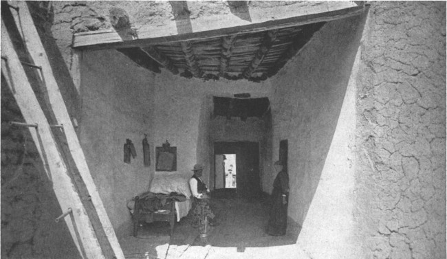 An excellent example of the entrance to an adobe house of
the Southwest, embodying the best traditions of this kind of
architecture
