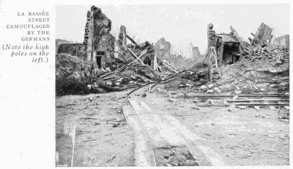 LA BASS�E.
STREET CAMOUFLAGED BY THE GERMANS
(Note the high poles on the left.)