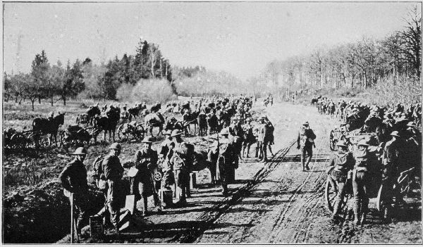 Copyright by the Committee on Public Information.

U. S. Marines in readiness to march to the front.