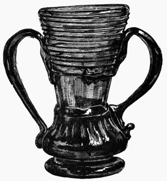 VASE OF GREEN GLASS, WITH BLACK HANDLES AND RIBS.&mdash;SPANISH, 17TH CENTURY.