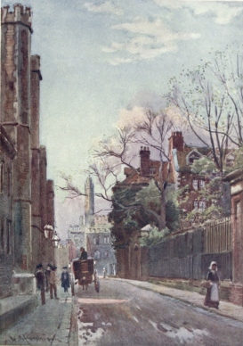 QUEENS’ LANE&mdash;THE SITE OF THE OLD MILL STREET

The Towers of Queens’ College Gateway are seen on the left, through the
trees on the right is St. Catherine’s College, and in the distance a
portion of King’s College.