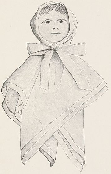 Doll with clothes made from kerchief and flat face