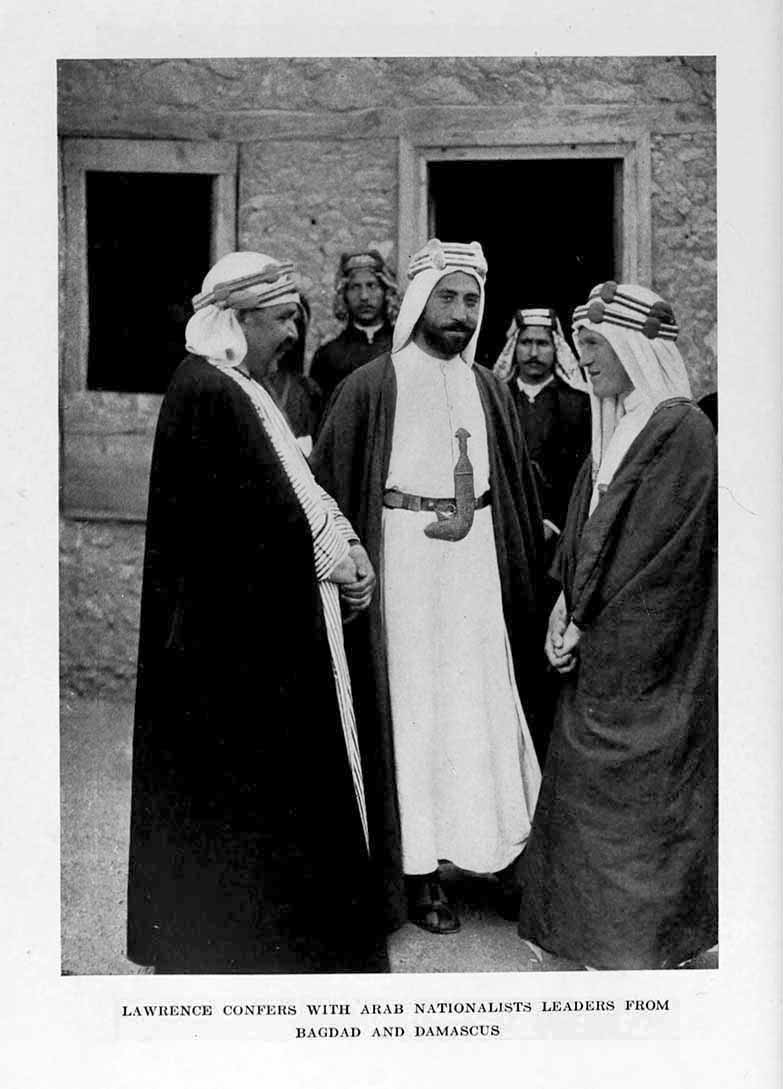Photograph: LAWRENCE CONFERS WITH ARAB NATIONALISTS
  LEADERS FROM BAGDAD AND DAMASCUS