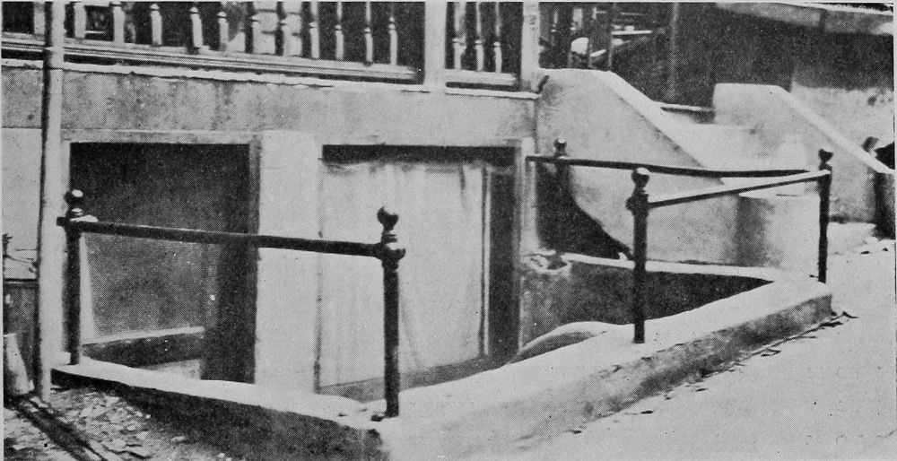 “Basement” Occupied by a Migrant Family. The Only
Opening in this Dwelling Appears in the Picture.