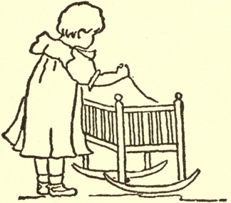 Covering Dollie in the cradle