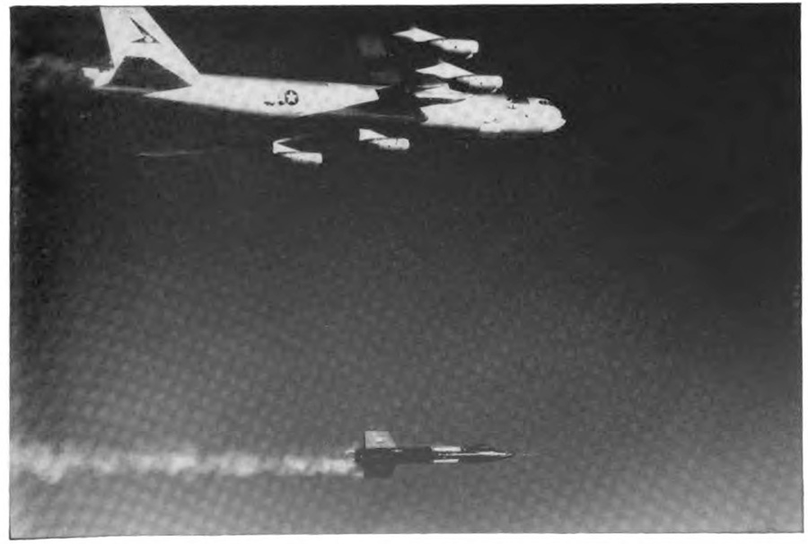 A small plane with a large contrail flying somewhat dower than a larger plane